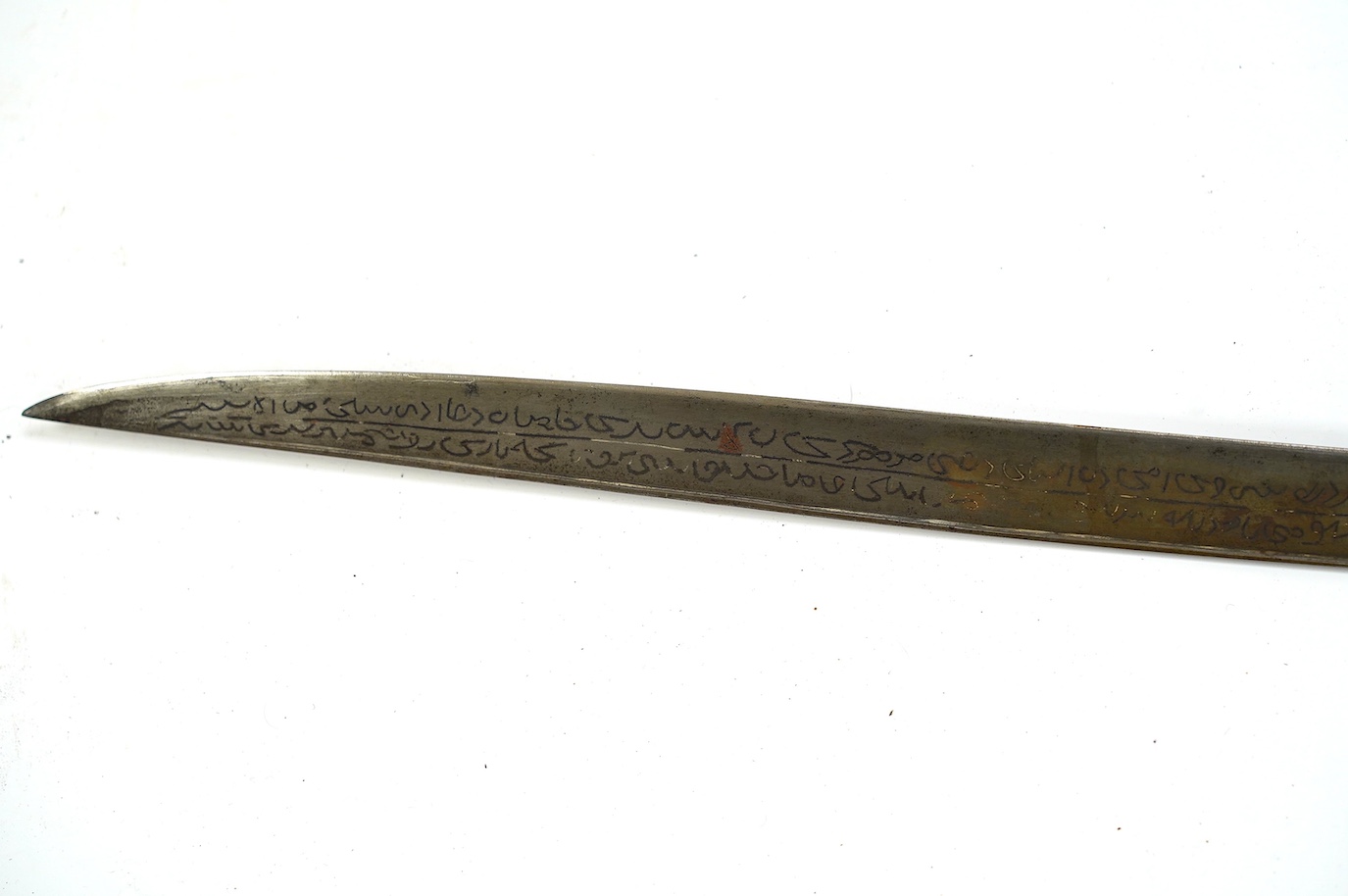 A 19th century Turkish Yataghan, blade inlaid with extensive inscriptions, embossed hilt, two piece horn grips, blade 55.5cm. Condition - good